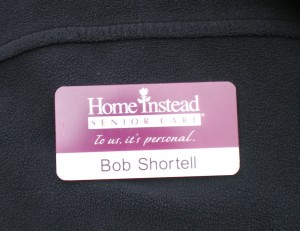 Home Instead Badge